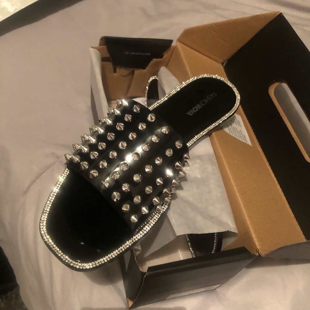 Women’s black and silver sandals.